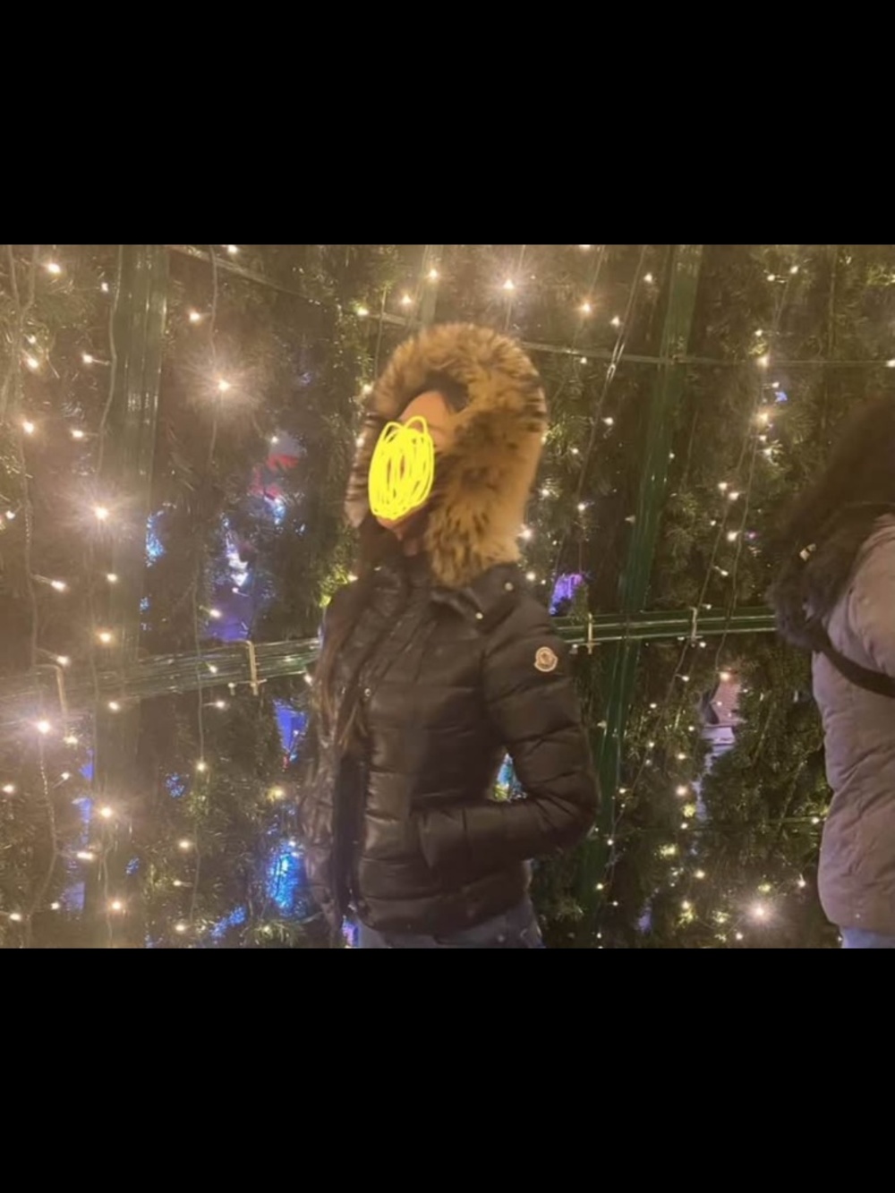 Moncler down jacket with raccoon fur hood